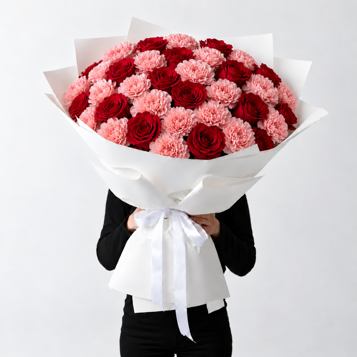 maxi bouquet garofani rosa e rose rosse.png